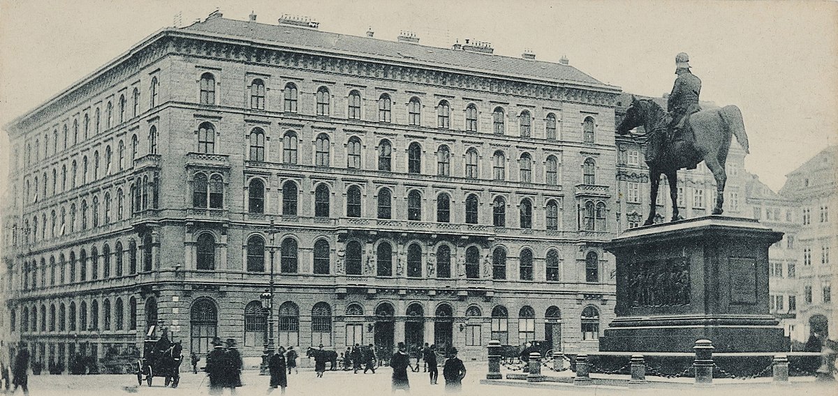 Black-and-white view of the Creditanstalt headquarters at Am Hof 6 in Vienna, with horse-drawn carriages on the street