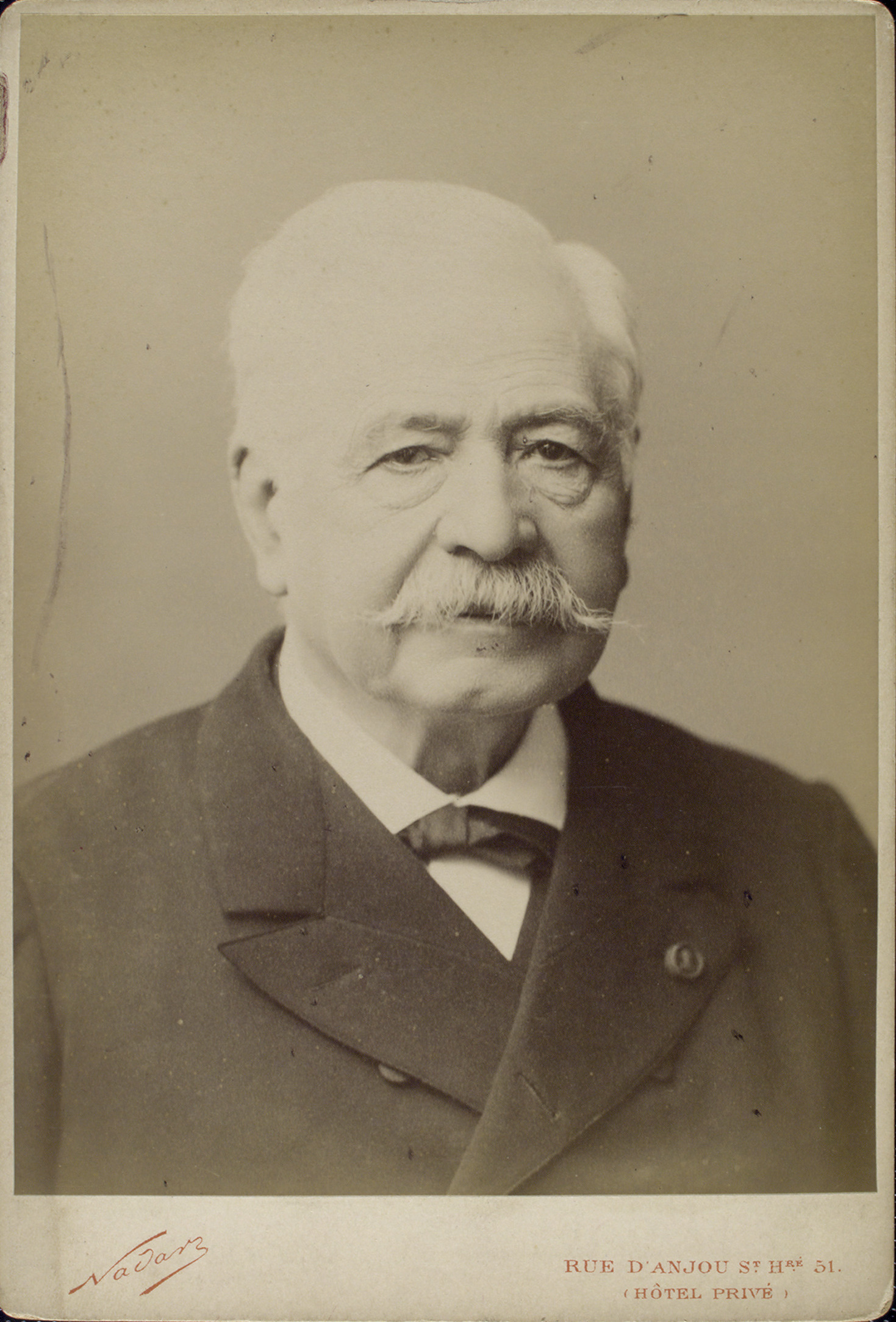 Studio portrait of Ferdinand de Lesseps, bearded and seated, photographed by Nadar in mid-career